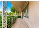 Covered porch with ornate railing, offering a relaxing outdoor space at 18001 N 99Th Dr, Sun City, AZ 85373