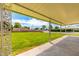 Covered patio overlooking the street and yard at 18001 N 99Th Dr, Sun City, AZ 85373