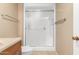 Clean shower with sliding glass door and grab bar at 18001 N 99Th Dr, Sun City, AZ 85373