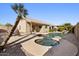 Inviting backyard oasis featuring a pool and spa at 2035 S 86Th Ln, Tolleson, AZ 85353