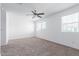 Bright bedroom with ceiling fan and neutral decor at 2222 S Deerfield Ln, Gilbert, AZ 85295