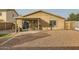 Backyard with covered patio and gravel landscaping at 25763 W Satellite Ln, Buckeye, AZ 85326