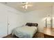 Cozy bedroom with a full bed and double door closet at 25763 W Satellite Ln, Buckeye, AZ 85326