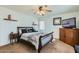 Spacious bedroom with carpeted flooring, ceiling fan and built-in wardrobe at 25763 W Satellite Ln, Buckeye, AZ 85326