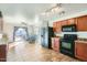 Open kitchen with stainless steel appliances and view of the backyard at 25763 W Satellite Ln, Buckeye, AZ 85326