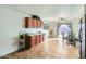 Kitchen boasts a dining area, access to backyard, and wood cabinetry at 25763 W Satellite Ln, Buckeye, AZ 85326