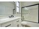 Modern bathroom with a walk-in shower and marble-look vanity at 29860 N 42Nd St, Cave Creek, AZ 85331