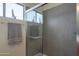 Shower with gray tile and sliding glass door at 39002 N Habitat Cir, Cave Creek, AZ 85331