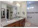 Bathroom boasts double sinks, granite countertops and a walk-in shower at 4380 W Ruby Dr, Eloy, AZ 85131