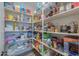 Well-stocked pantry with shelving offering generous storage at 4380 W Ruby Dr, Eloy, AZ 85131