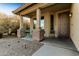 Charming front porch with decorative stone accents and a covered entryway at 6219 S 30Th Dr, Phoenix, AZ 85041