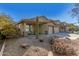 Front yard with desert landscaping and a small patio area at 6219 S 30Th Dr, Phoenix, AZ 85041