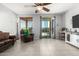 Living Room with sliding glass doors that lead to the back patio or yard at 6219 S 30Th Dr, Phoenix, AZ 85041