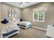Charming bedroom with two twin beds and large window at 7262 E Lower Wash Pass, Scottsdale, AZ 85266
