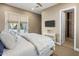 Serene bedroom with ensuite bathroom and backyard access at 7262 E Lower Wash Pass, Scottsdale, AZ 85266