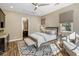 Comfortable bedroom with ensuite bathroom and sitting area at 7262 E Lower Wash Pass, Scottsdale, AZ 85266