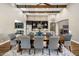 Elegant dining room features a large wood table and comfortable seating for eight at 7262 E Lower Wash Pass, Scottsdale, AZ 85266