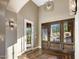 Bright and airy entryway with beautiful wood floors and a grand door at 7262 E Lower Wash Pass, Scottsdale, AZ 85266