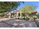 Stunning home exterior with landscaped front yard and courtyard at 7262 E Lower Wash Pass, Scottsdale, AZ 85266