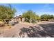 Stunning desert landscape surrounds this single-story home with a large courtyard at 7262 E Lower Wash Pass, Scottsdale, AZ 85266