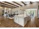 Spacious kitchen with an island, granite countertops, and stainless steel appliances at 7262 E Lower Wash Pass, Scottsdale, AZ 85266
