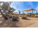 Community playground with shaded play structures at 8926 W Christopher Michael Ln, Peoria, AZ 85345