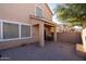 Covered patio with tile flooring and a small sitting area at 964 E Ranch Rd, Gilbert, AZ 85296