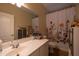 Bathroom with shower/tub combo and vanity at 964 E Ranch Rd, Gilbert, AZ 85296