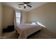 Cozy bedroom with full-size bed and window at 964 E Ranch Rd, Gilbert, AZ 85296