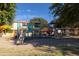 Modern playground with slides and climbing structures at 964 E Ranch Rd, Gilbert, AZ 85296