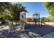 Modern playground with spiral slide and climbing features at 964 E Ranch Rd, Gilbert, AZ 85296