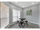 Small breakfast nook with round table and three industrial stools at 9711 E Mountain View Rd # 1516, Scottsdale, AZ 85258