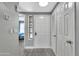 Bright entryway with white doors and gray walls at 9711 E Mountain View Rd # 1516, Scottsdale, AZ 85258