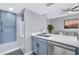Compact kitchen with white countertops and stainless steel dishwasher at 9711 E Mountain View Rd # 1516, Scottsdale, AZ 85258