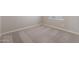 Simple bedroom with neutral carpeting and lots of natural light at 10359 N 115Th Ave, Youngtown, AZ 85363