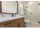 Elegant bathroom with a single vanity and glass-enclosed shower at 10986 N Northfield St, Surprise, AZ 85388