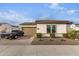 View of the garage and driveway with a truck parked at 10986 N Northfield St, Surprise, AZ 85388