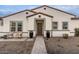 Inviting front entrance with a pathway leading to a double door at 10986 N Northfield St, Surprise, AZ 85388