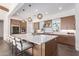 Modern kitchen with a large island and stainless steel appliances at 10986 N Northfield St, Surprise, AZ 85388