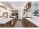 Modern kitchen with stainless steel appliances and a large island at 10986 N Northfield St, Surprise, AZ 85388