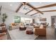 Living room with comfy seating, high ceilings, and backyard view at 10986 N Northfield St, Surprise, AZ 85388