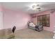 Charming bedroom with pink walls and a twin-sized bed at 11867 W Grant St, Avondale, AZ 85323
