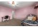 Cozy bedroom featuring a Hello Kitty theme and a desk at 11867 W Grant St, Avondale, AZ 85323