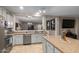 Kitchen boasts granite countertops and ample cabinet space at 11867 W Grant St, Avondale, AZ 85323