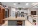 Well-equipped kitchen featuring granite island and stylish cabinetry at 11867 W Grant St, Avondale, AZ 85323