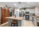 Modern kitchen with granite countertops and stainless steel appliances at 11867 W Grant St, Avondale, AZ 85323