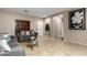 Living room with gray couches and tile flooring at 11867 W Grant St, Avondale, AZ 85323