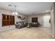 Living room with gray couches and tile flooring at 11867 W Grant St, Avondale, AZ 85323