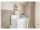 Laundry room with a washer and dryer, and additional shelving at 12828 N 113Th Ave # 4, Youngtown, AZ 85363