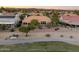 Aerial view of the house, highlighting its backyard and location next to the golf course at 13555 W Via Tercero --, Sun City West, AZ 85375